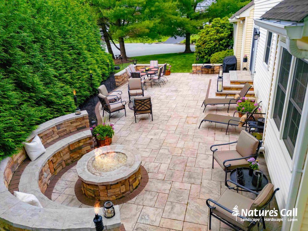 Custom patio and outdoor living space with fire pit — Northern Delaware